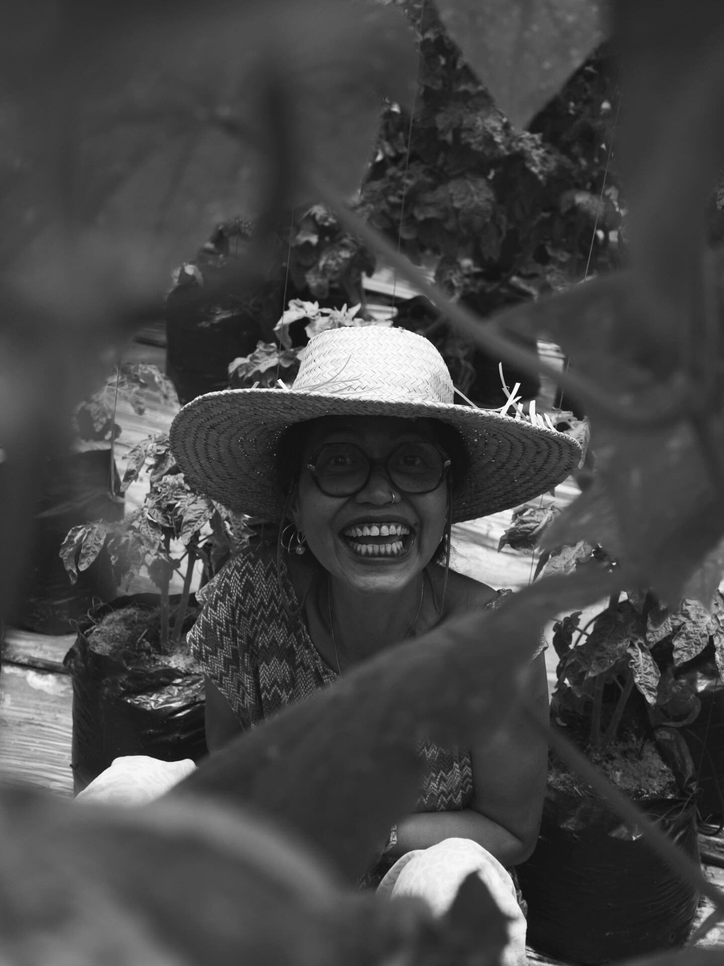 Demi Indriyanti, founder of PuriTomato, in the farm greenhouse